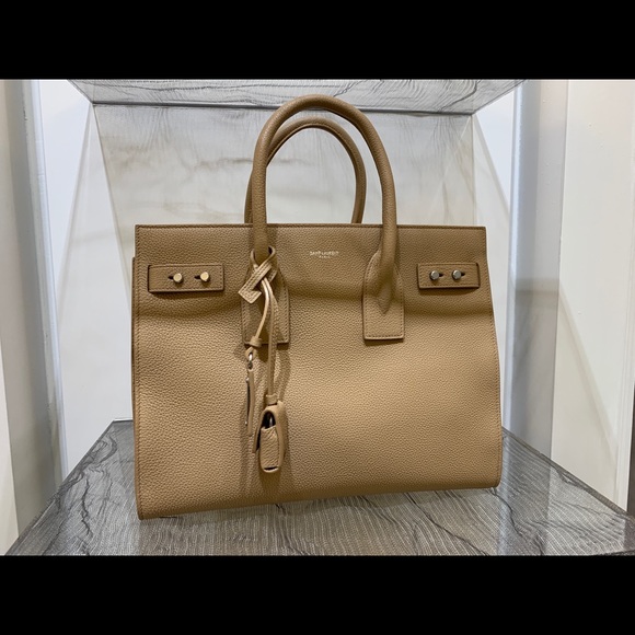 Yves Saint Laurent Handbags - Brand new YSL purse. Reselling a gift